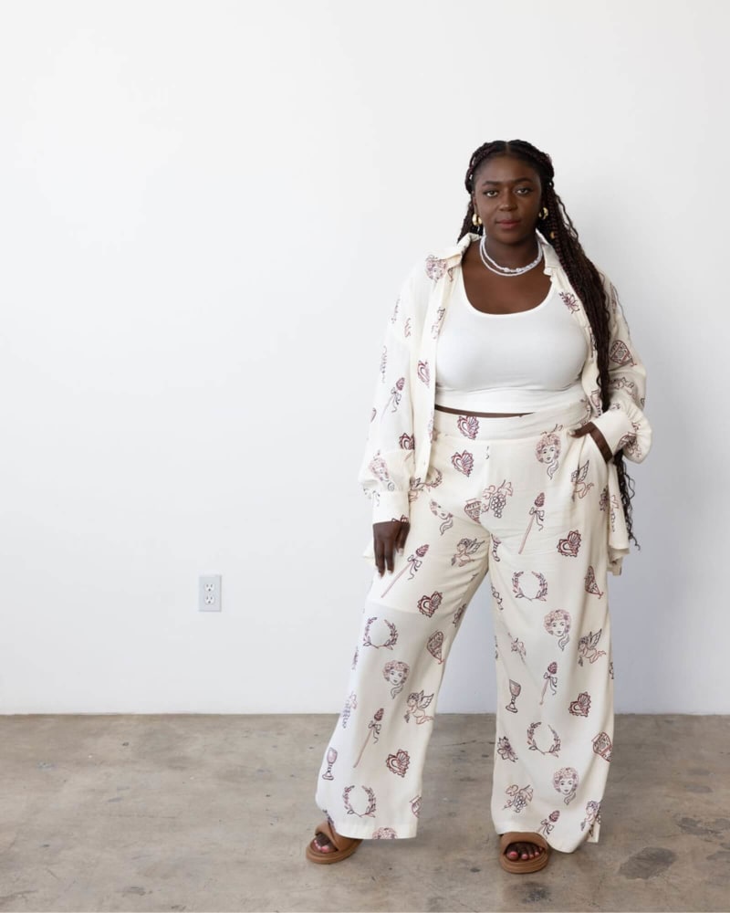 Front of a model wearing a size 5 Katie Stretch Crop Top in White by Dani Marie. | dia_product_style_image_id:312328